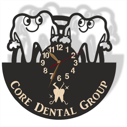 Custom dental wall clock with smiling tooth characters and clinic name engraving