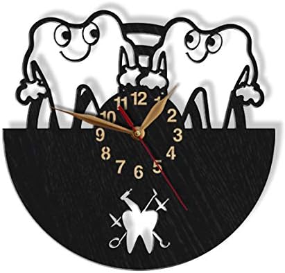 Laser-cut wooden dentist clock with cartoon teeth and custom practice name