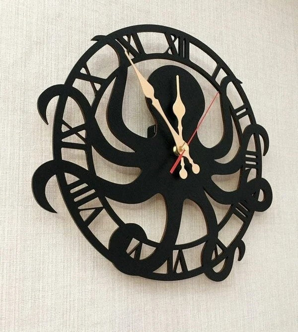 Black octopus wall clock, nautical decor with Roman numeral ring