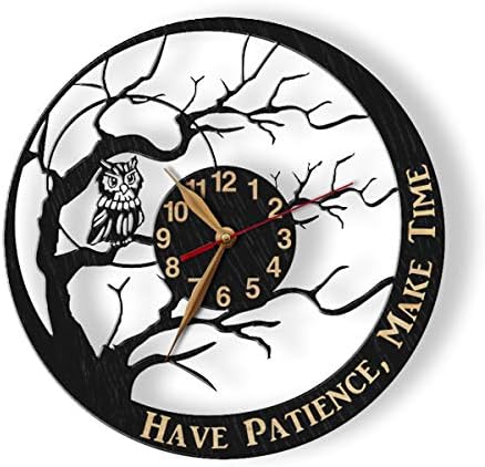 Wall clock with owl design and motivational quote