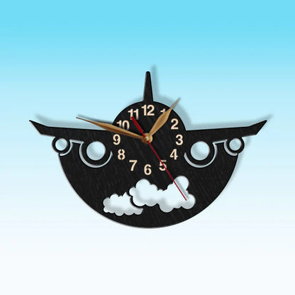 Stylish aviation clock with golden hands and black airplane shape