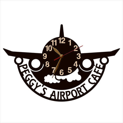 Aviation cafe-themed clock with cafe name