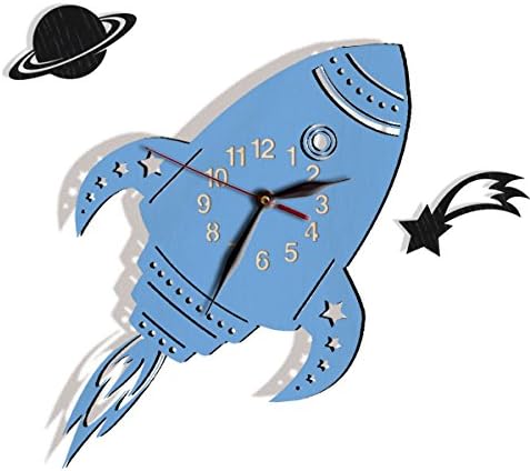 Blue rocket-shaped wall clock with Saturn and comet accents
