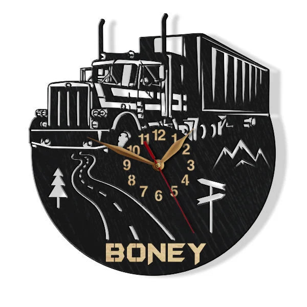 Wall clock with a truck design and custom  name on a black background