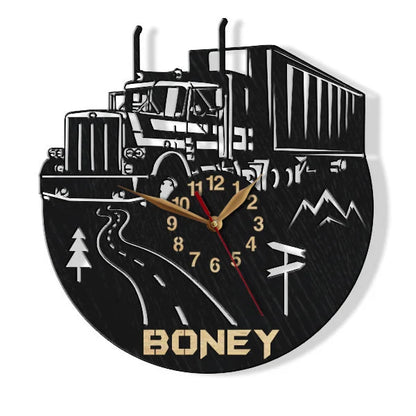 Wall clock with a truck design and custom  name on a black background