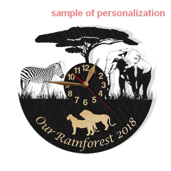 Close‑up of custom engraving on safari animal wall clock