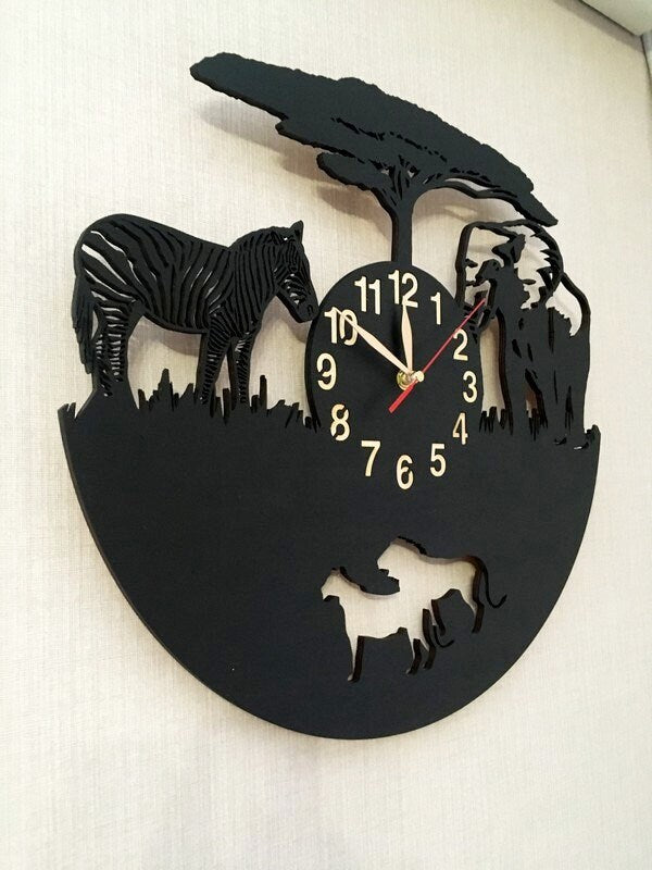 Side view of black wooden safari clock