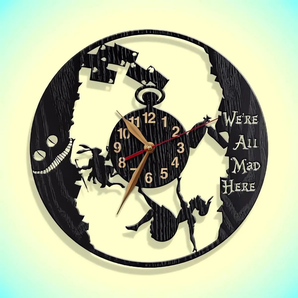 Alice in Wonderland clock with “We’re All Mad Here” quote and falling silhouette