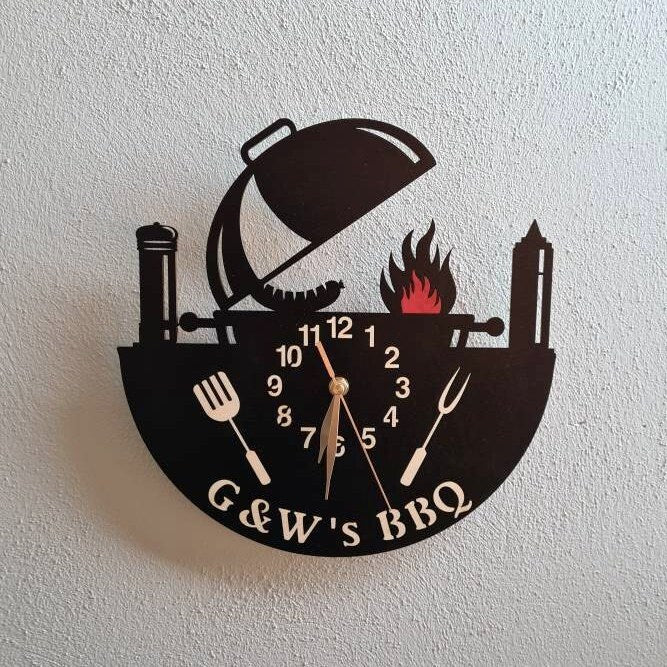 BBQ grill-shaped wall clock with fire, tongs, and spatula – for kitchen decor