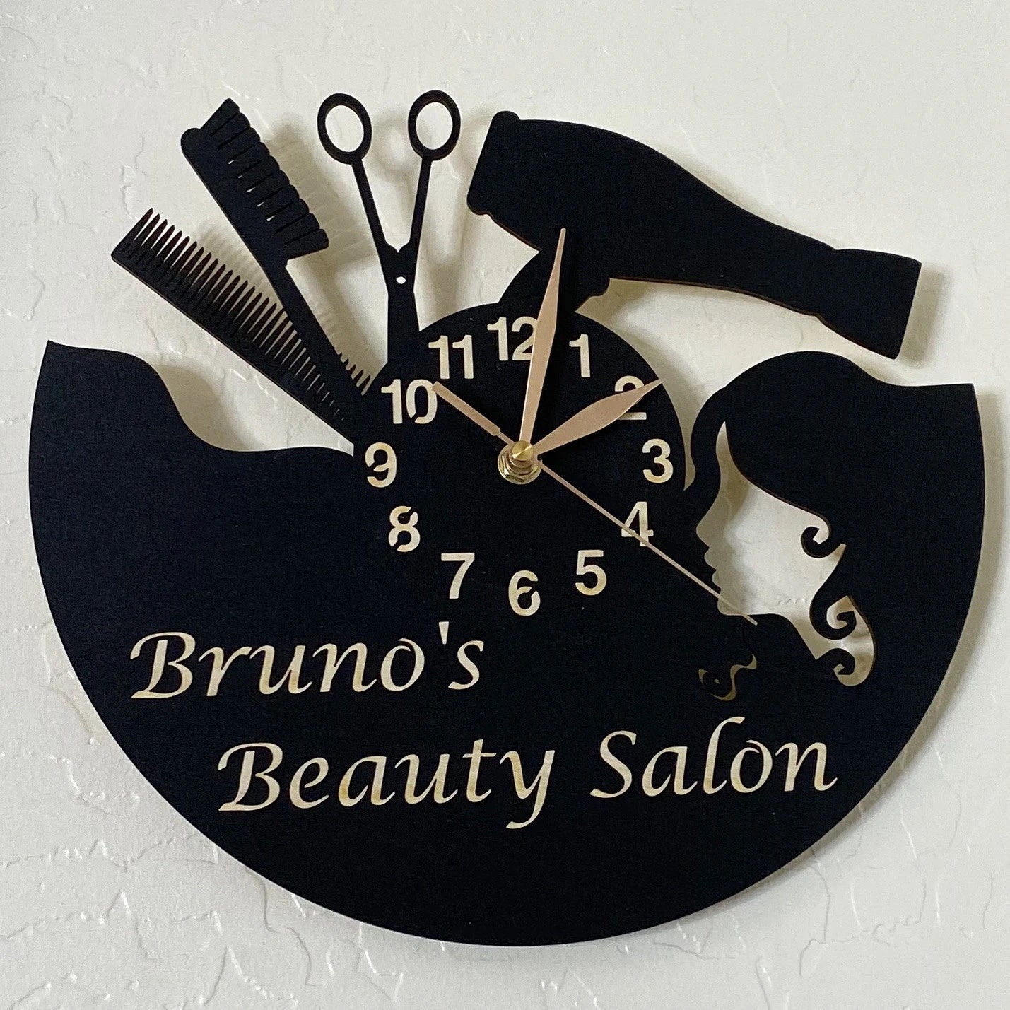 Personalized beauty salon wall clock with elegant woman’s face and hairstyling tools