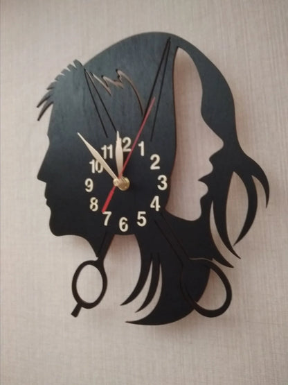 Wall clock with a design for a beauty salon