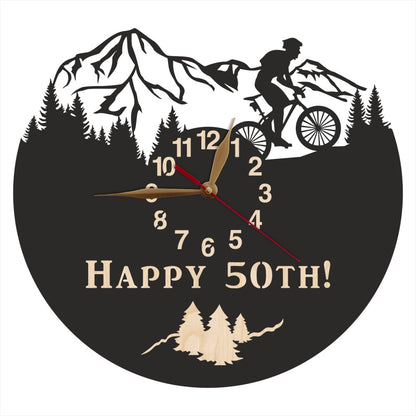 Wall clock for biking with Happy 50th engraving and mountain scenery