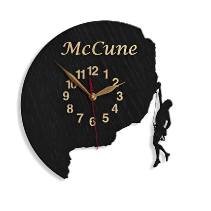 Wall clock with male climber silhouette hanging off a cliff, personalized with name