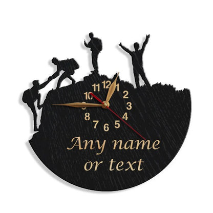 Mountain climbing wall clock with group hikers and customizable text space below