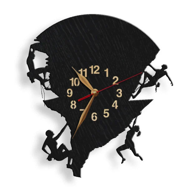 Wall clock with four climbers scaling a vertical rock face
