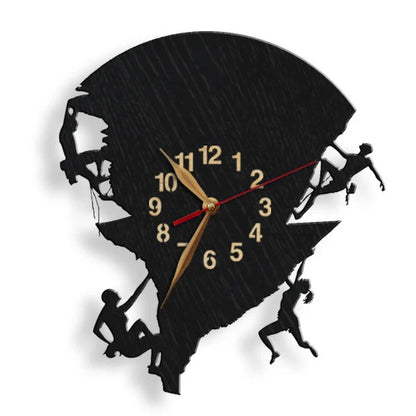 Wall clock with four climbers scaling a vertical rock face