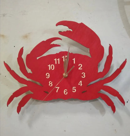 Red crab wall clock mounted on light wall – nautical theme for kitchen or restaurant