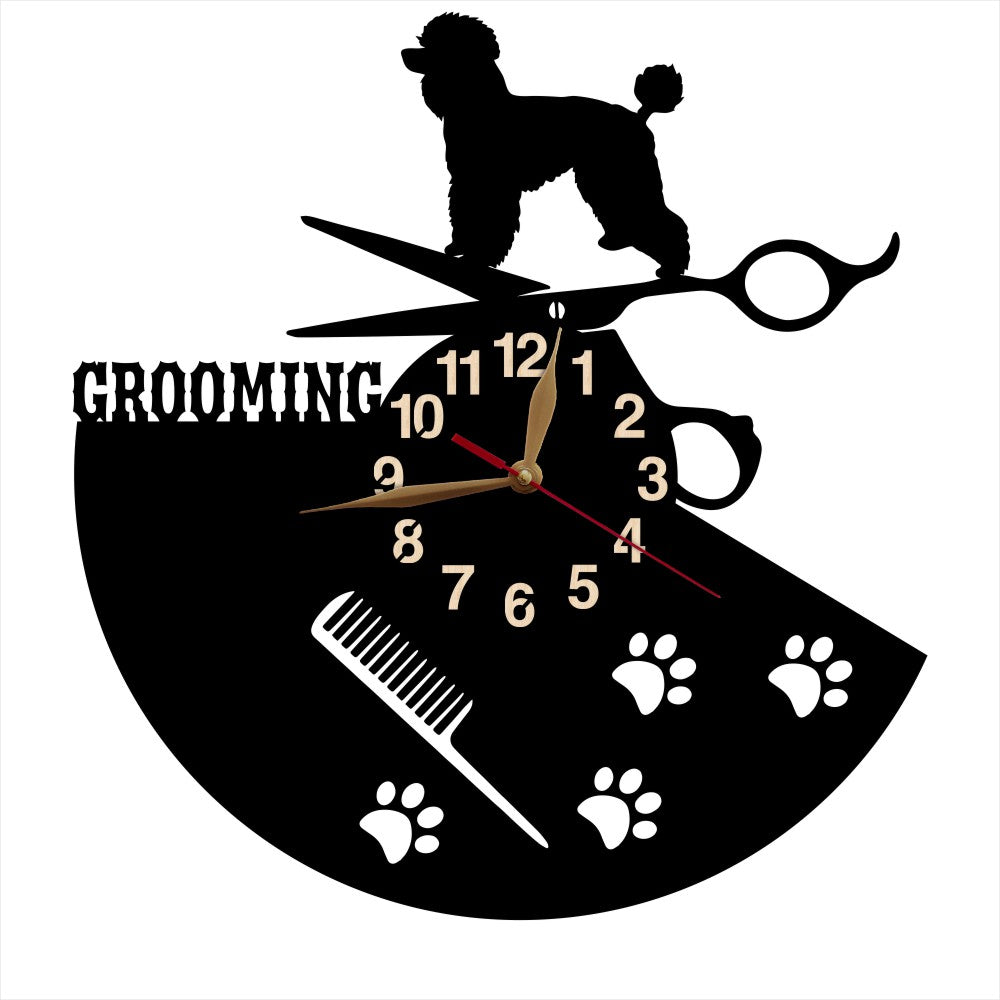 Decorative clock with grooming-themed design featuring a poodle, scissors, and paw prints on a white background.