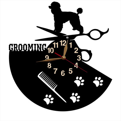 Decorative clock with grooming-themed design featuring a poodle, scissors, and paw prints on a white background.