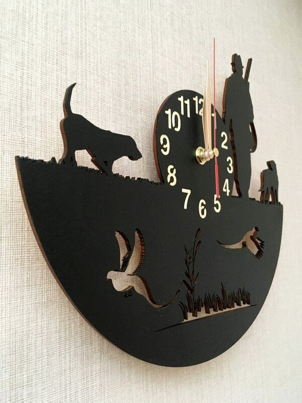 Side view of laser-cut hunting wall clock with huner, dogs and pheasants