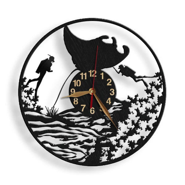 Wall clock with divers swimming under a manta ray near coral reef – front view
