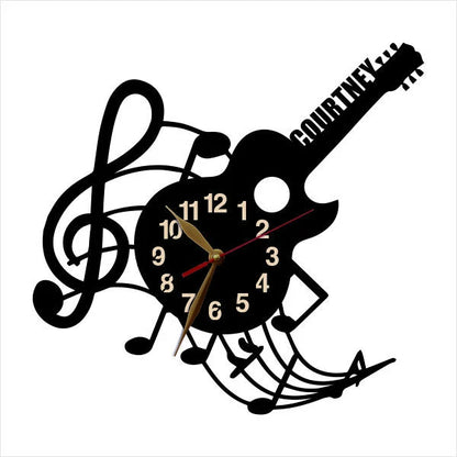 Wall art clock with guitar silhouette and name on fretboard
