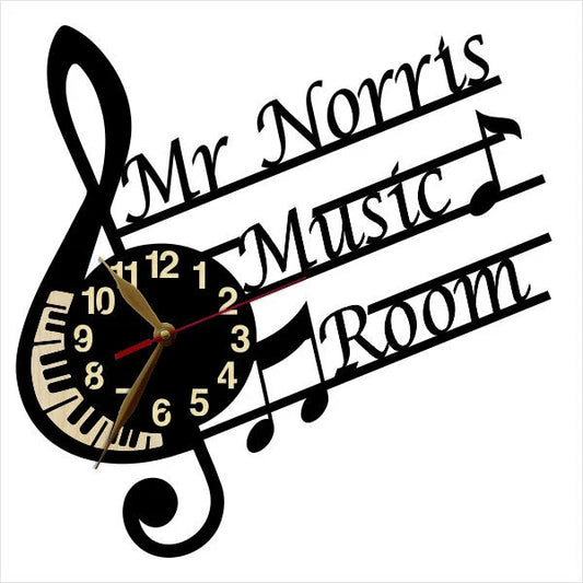 Music clock with name and decorative musical notation