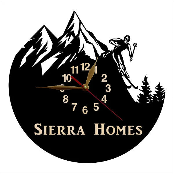 Personalized skier wall clock with mountain peaks and custom inscription
