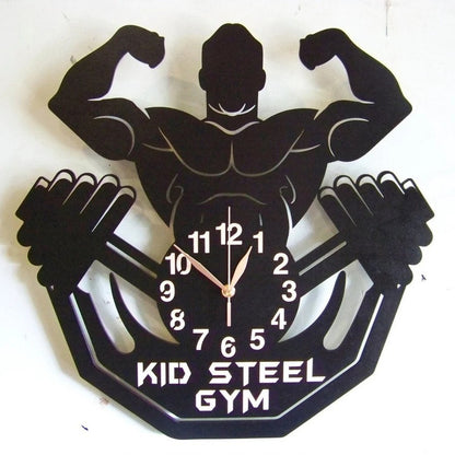 Gym-themed clock featuring male flexing silhouette and custom name option
