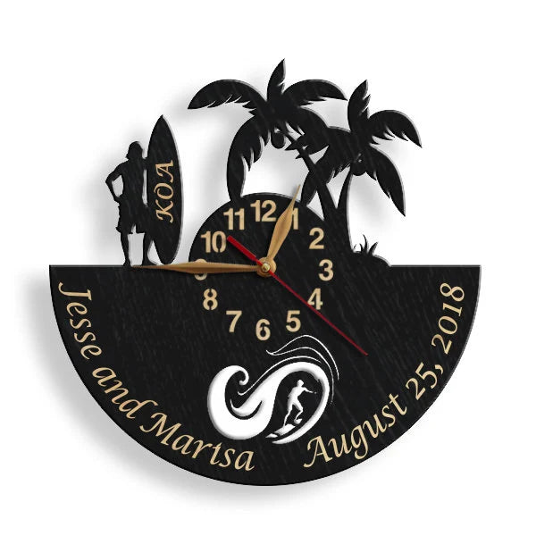 Personalized surfer clock with male figure and engraved surfboard on black wood