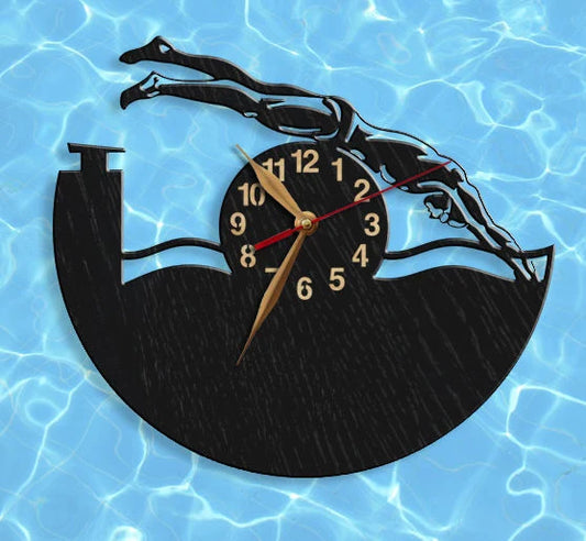 Swimming-themed clock featuring silhouette of boy diver in action, pool-inspired design.