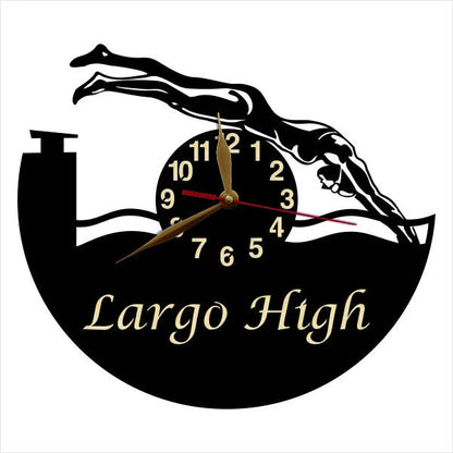 Wall clock design showing female swimmer in dive position, personalized with a name