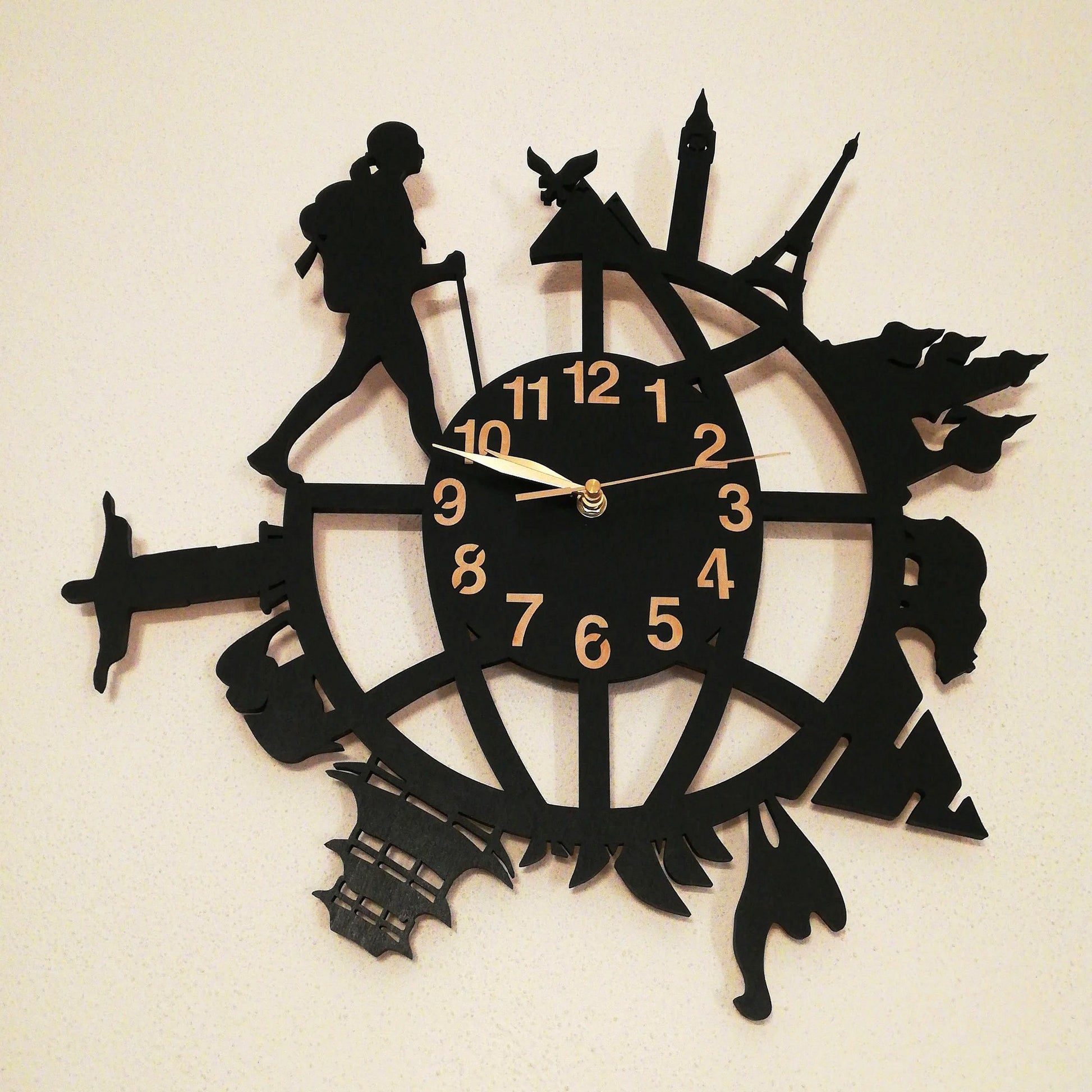 Decorative wall clock for travelers featuring walking figure and silhouettes of global destinations
