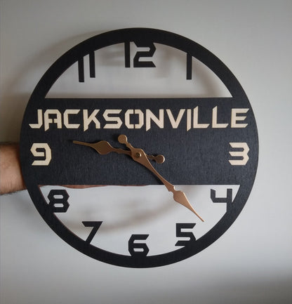 Custom wooden wall clock with the word Jacksonville engraved in the center