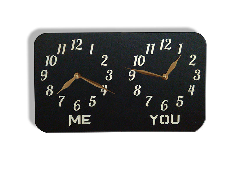 A personalized dual-time wall clock. The labeles 'ME' and 'YOU' is customized and can be changed to custom inscriptions