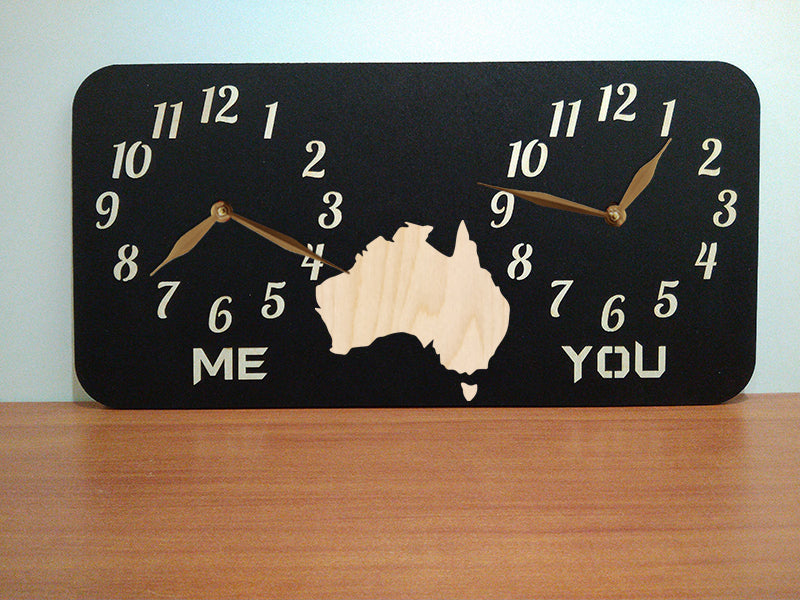 A personalized dual-time wall clock, featuring Australia map illustration between two sets of hands. The labeles 'ME' and 'YOU' is customized and can be changed to custom cities names.