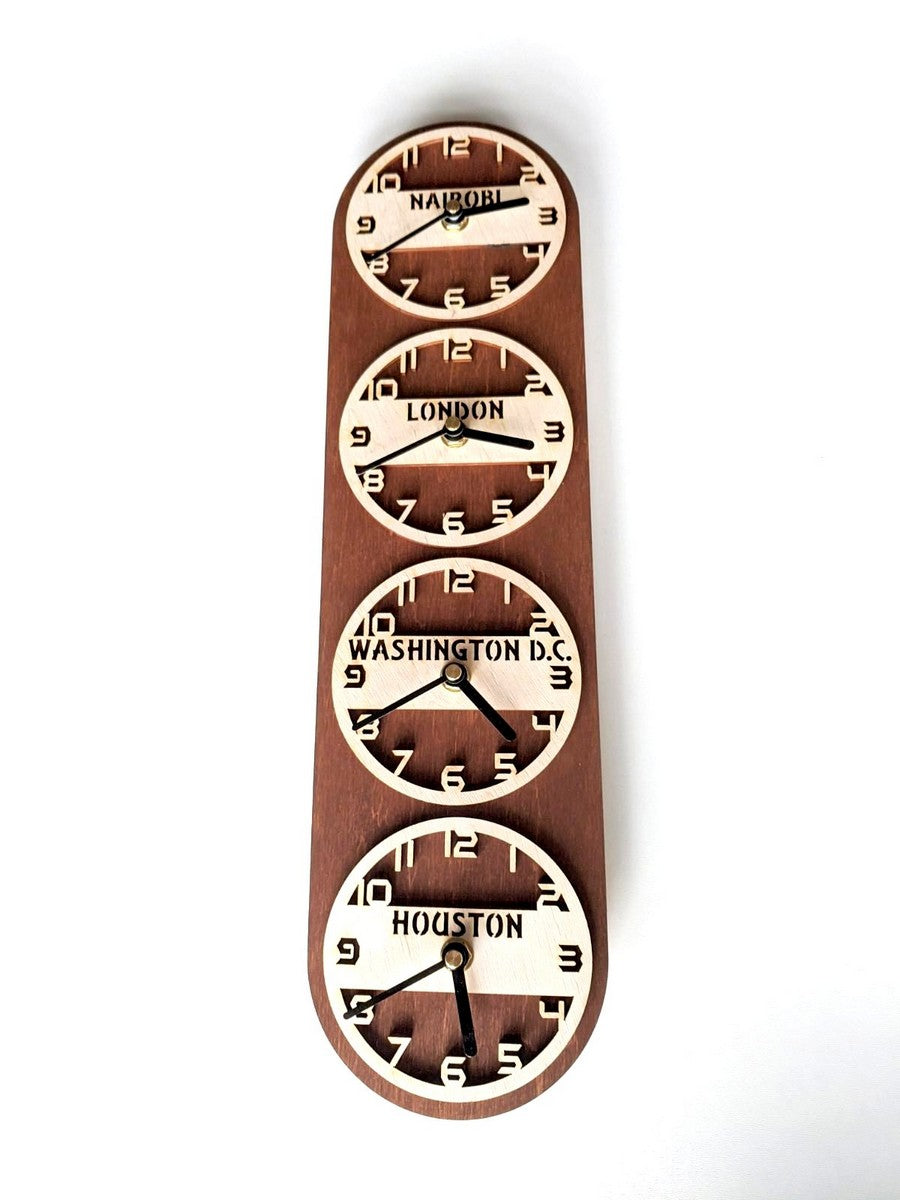 Custom vertical narrow multi-clock set with engraved cities names.