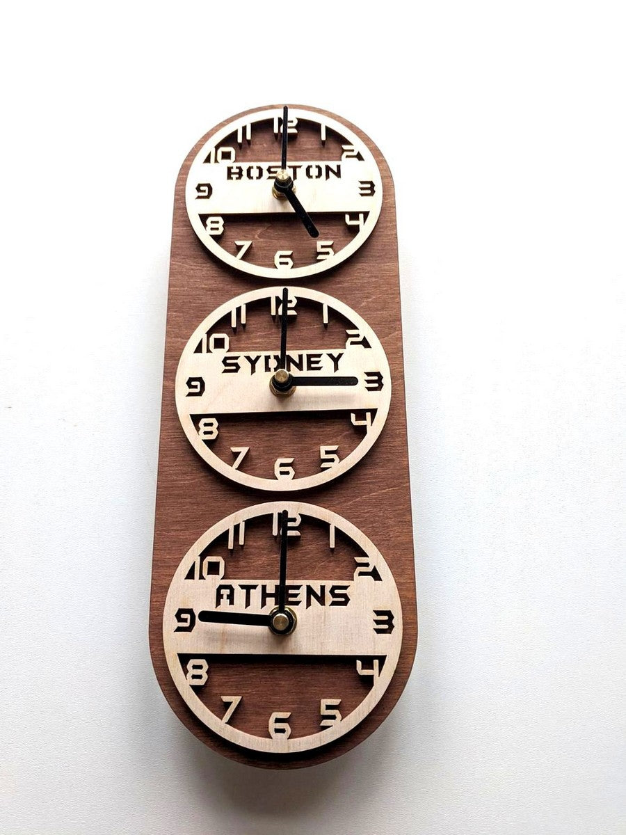 Vertical multi-zone wooden wall clock showing times for Boston, Sydney, and Athens time zone