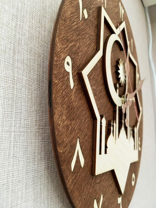 Brown mosque clock hanging on neutral wall