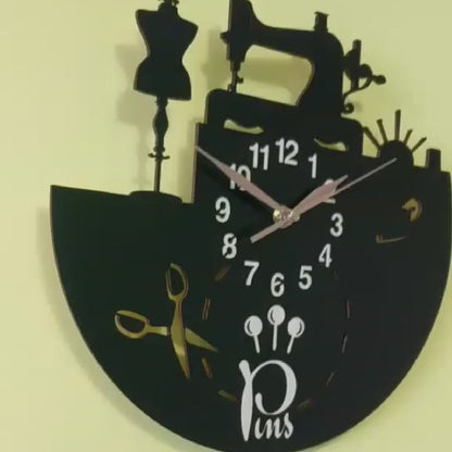 Video showing a handmade wall clock for sewing salons featuring a sewing machine, scissors, and thread spools design