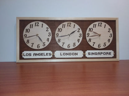 Custom multi-clock wall decor showing different global times for home or workspace.