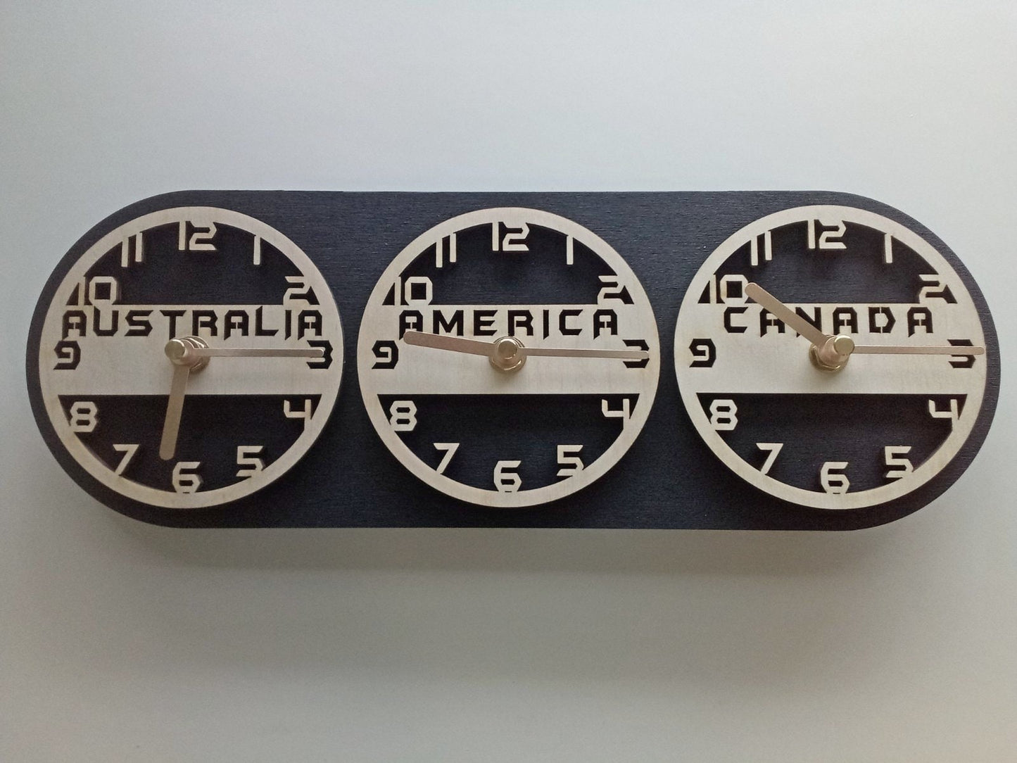 Set of custom countries names wall clocks designed to show different local times