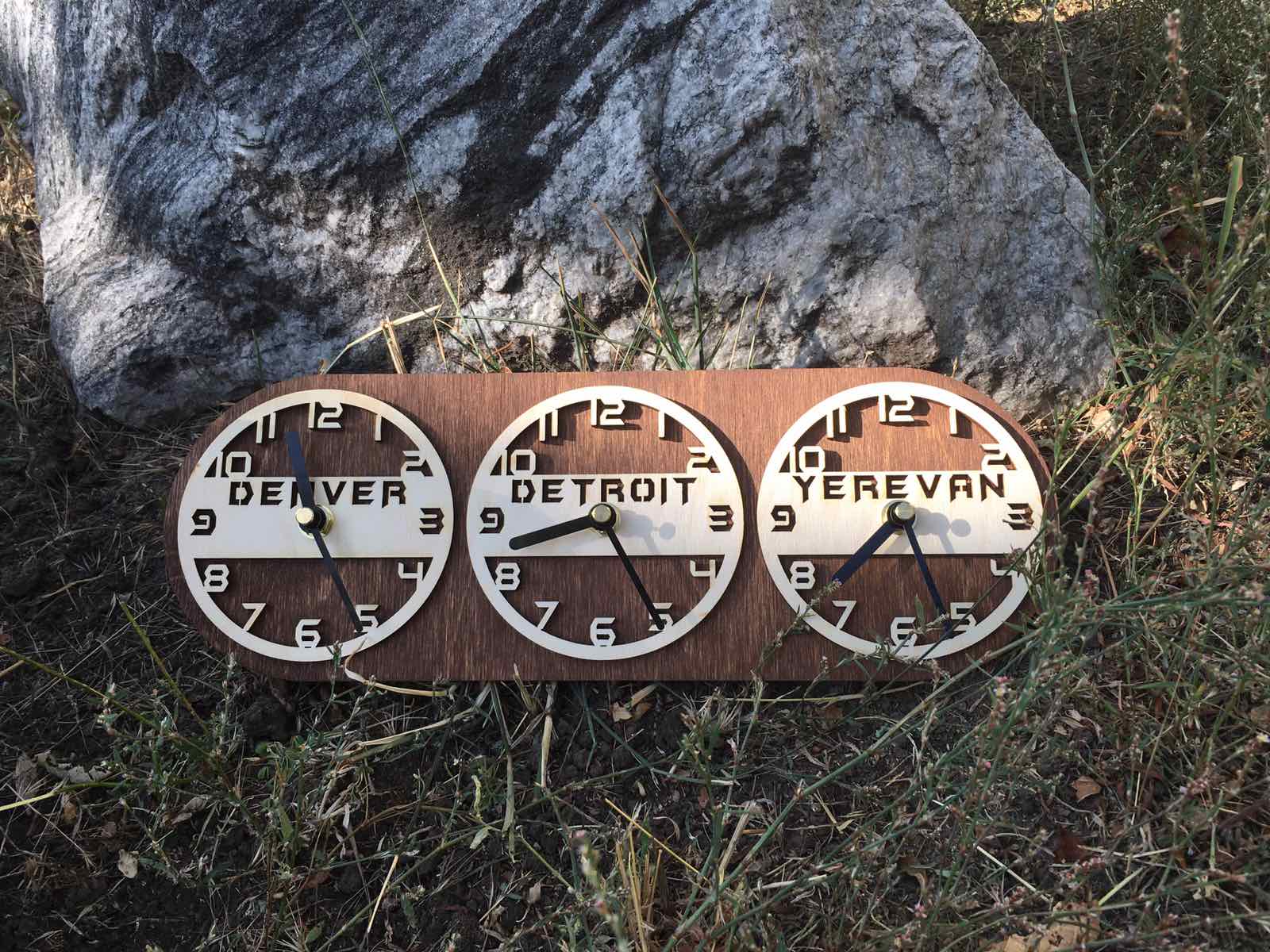 Rustic-style world time clock set with laser-cut numbers and names